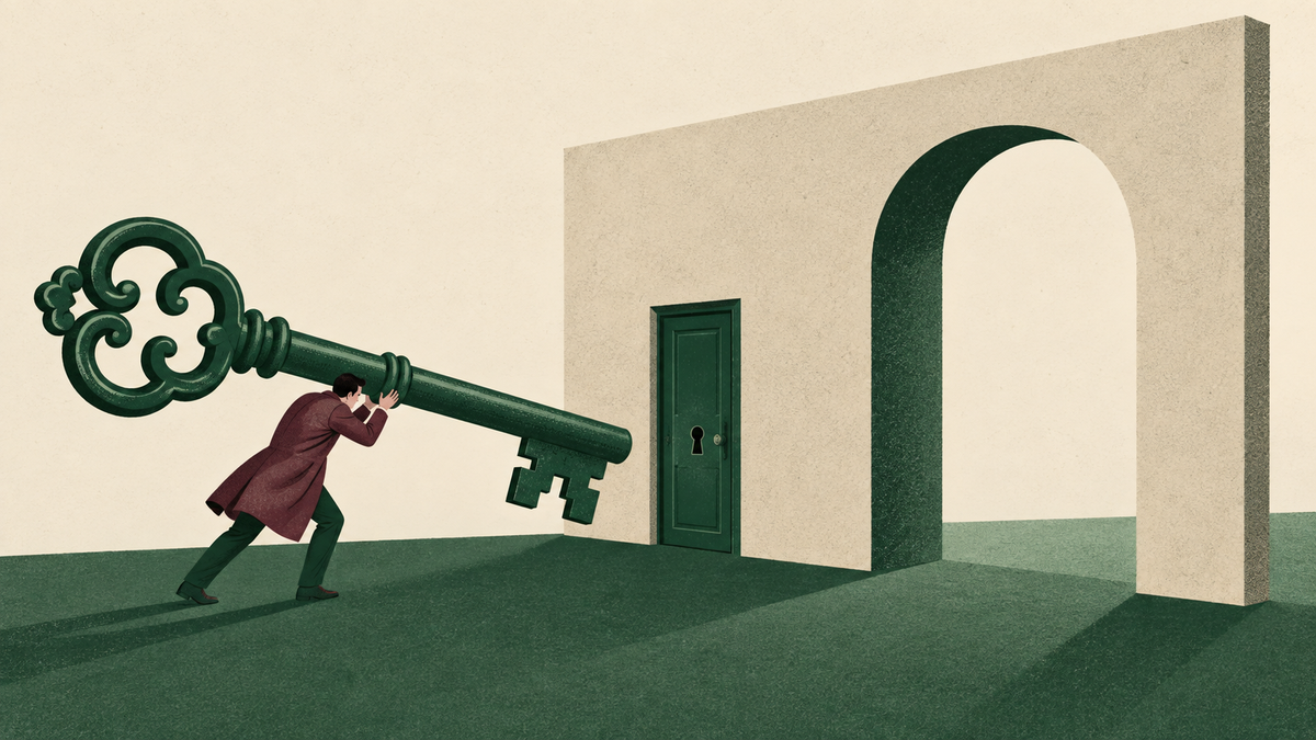 A person carries an enormous green key towards a small locked door, overlooking the open archway beside it.