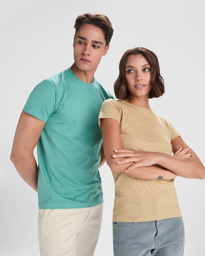 Two people wearing plain t-shirts against a white background